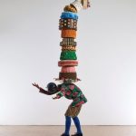 Yinka Shonibare MBE RA b.1962 Cake Kid 2014 Unique life size mannequin Dutch wax printed cotton textile leather gold polyester and plaster 283 x 114 x 110 cm 111 1 2 x 45 x 43 1 3 in